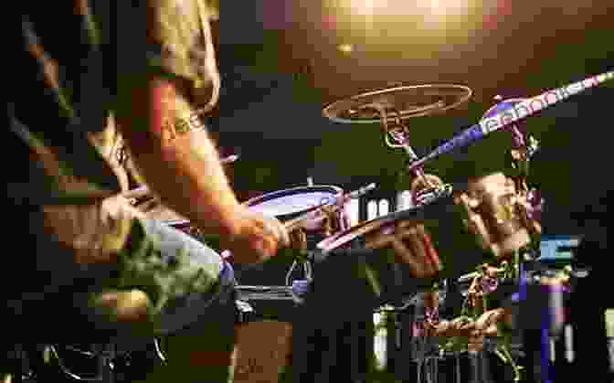 An Image Of A Drummer Playing Along With Music The Beginner Drum Book: Step By Step Guide You Need To Be A Good Drummer: Beginners Drum